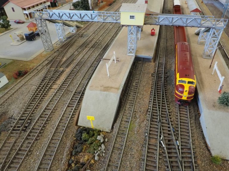 Over-head station crossing